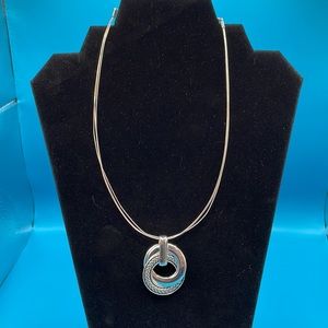 Interlock silver colored rings on cable N105